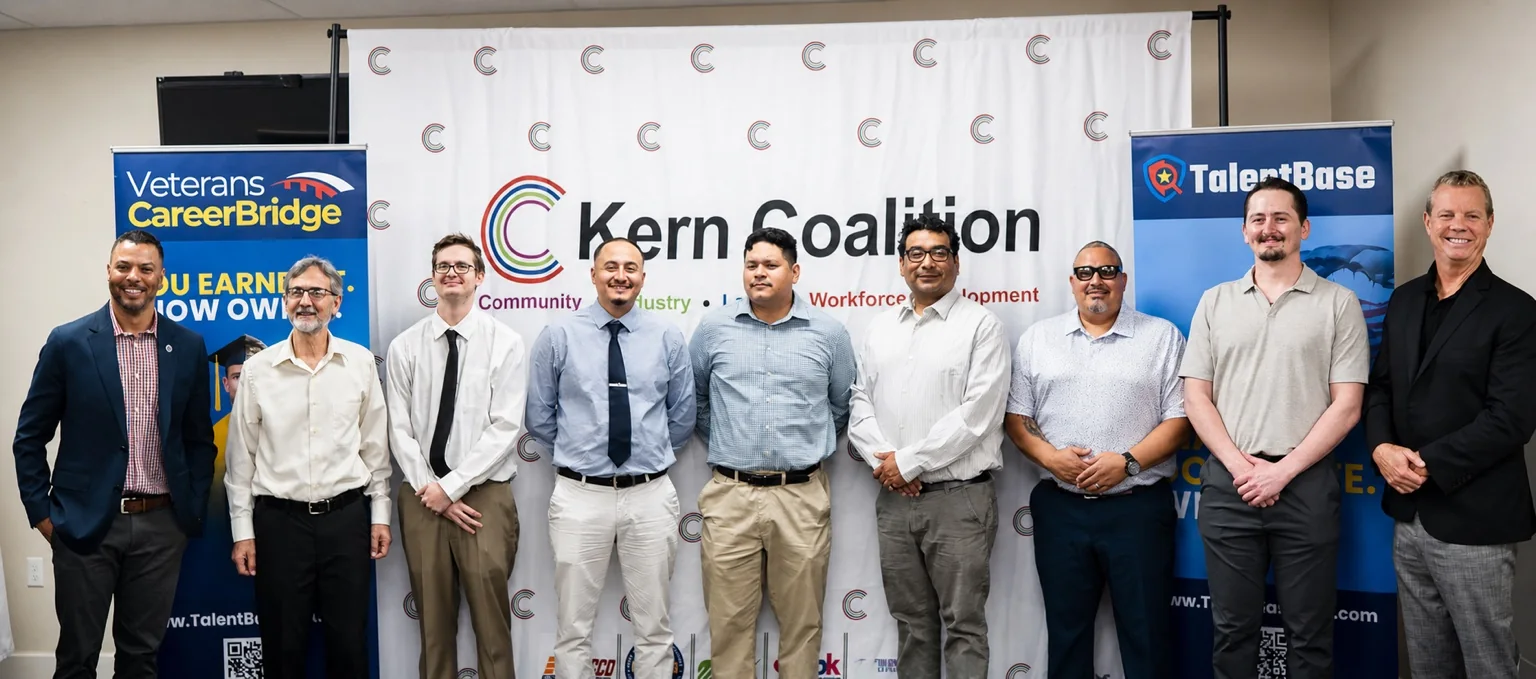 Veterans CareerBridge graduates standing together after a recognition ceremony